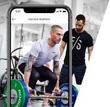 a man lifting weights in a gym