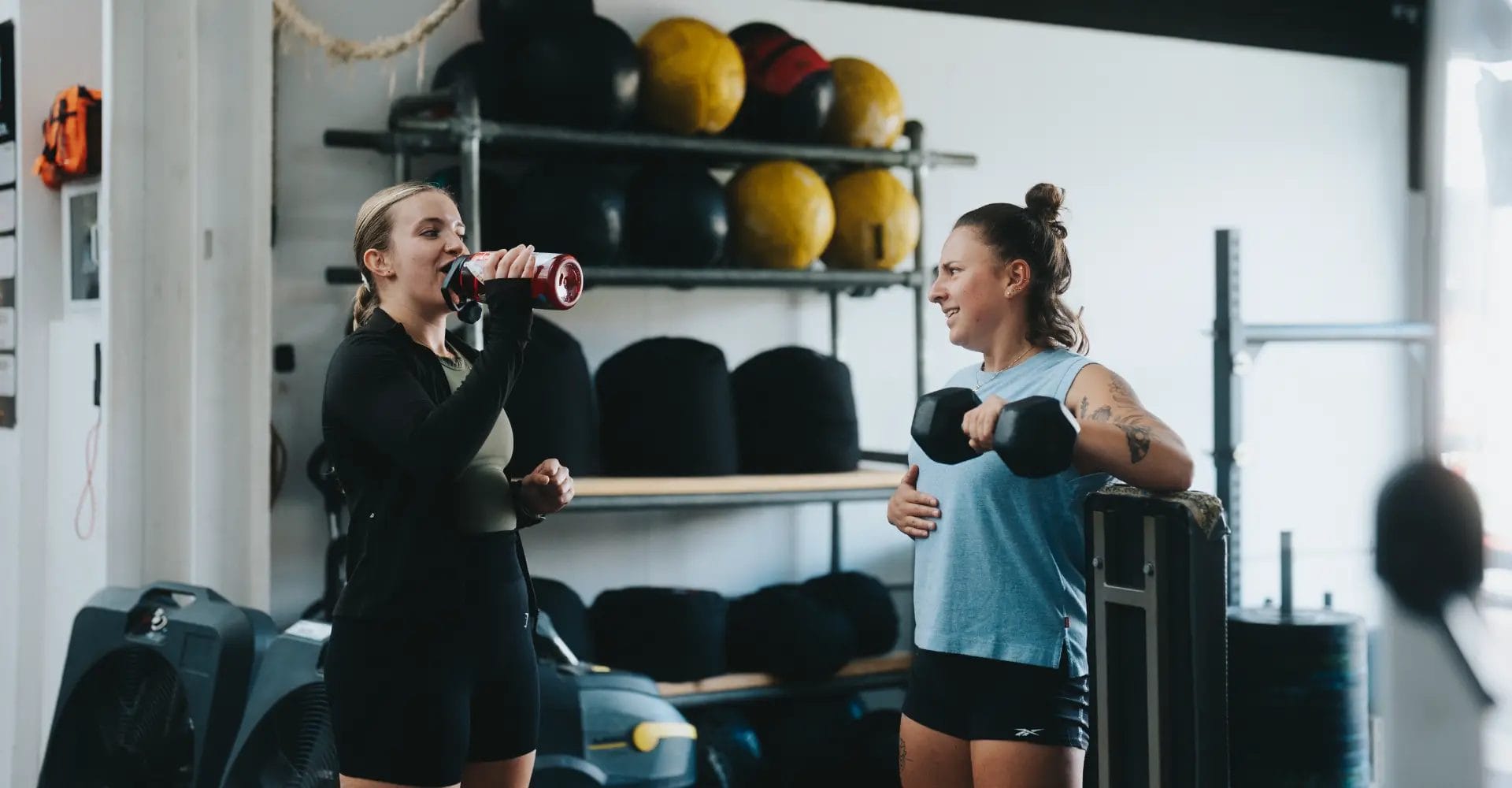 Women talking and working out